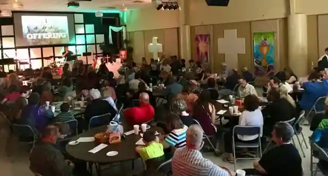 People gathered for worship at KCMC, photographed in 2017